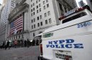 A New York City Police Department vehicle is parked near the New York Stock Exchange, Thursday morning, Oct. 18, 2012. A Bangladeshi man, 21-year-old Quazi Mohammad Rezwanul Ahsan Nafis, snared in an FBI terror sting, considered targeting a high-ranking government official and the New York Stock Exchange before authorities say he raised the bar further by picking one of New York City's most fortified sites: The Federal Reserve. (AP Photo/Richard Drew)