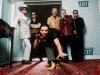 FILE - in this 1997 file photo,  members of the Australian rock band INXS pose for a group portrait at the Ritz Carleton Hotel in Aspen. Colo. They are, from left, Tim Farriss, Kirk Pengilly, Michael Hutchence, foreground, Jon Farriss, Garry Gary Beers and Andrew Farriss. Drummer Farriss announced the end of the band's remarkable run of performances during a concert in the West Australia city of Perth earlier in the week of Nov. 11, 2102. The band later confirmed the news in a statement. (AP Photo/James Minchin, File)