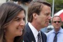 John Edwards, right, and his daughter Cate Edwards, left, arrive at a federal courthouse during the seventh day of jury deliberations in his trial on charges of campaign corruption in Greensboro, N.C., Tuesday, May 29, 2012. Edwards has pleaded not guilty to six counts related to campaign finance violations over nearly $1 million from two wealthy donors used to help hide the Democrat's pregnant mistress as he sought the White House in 2008. (AP Photo/Chuck Burton)