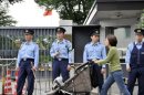 A spy scandal involving a Chinese diplomat working at the embassy in Tokyo could cost a cabinet minister his job