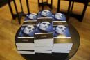 Copies of the Morrissey "Autobiography" lie stacked up on display at a branch of a bookstore in north London, Friday, Oct. 18, 2013. The memoir from the former frontman of The Smiths _ titled simply "Autobiography" _ is the first rock bio published under the venerable Penguin Classics imprint, home to Aeschylus, Jane Austen and Oscar Wilde. That has horrified some people in the publishing industry, but not the singer's many fans, who snapped up the book as soon as it was published Thursday. (AP Photo/Matt Dunham)