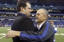 Indianapolis Colts head coach Chuck Pagano, right, is hugged by general manager Ryan Grigson after he walks onto the field before an NFL football game against the Houston Texans, Sunday, Dec. 30, 2012, in Indianapolis. (AP Photo/Michael Conroy)