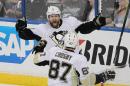 Pittsburgh Penguins right wing Phil Kessel (81) celebrates his goal with teammate Pittsburgh Penguins center Sidney Crosby (87), during the first period of Game 6 of the NHL hockey Stanley Cup Eastern Conference finals Tuesday, May 24, 2016, in Tampa, Fla. (AP Photo/Brian Blanco)