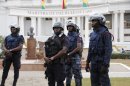 Policemen stand guard in front of Ghana's Supreme Court on August 29, 2013 in Accra