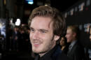 FILE - In this Oct. 28, 2013 file photo, Felix "PewDiePie" Kjellberg's arrives at the Los Angeles premiere of "Ender's Game" at TCL Chinese Theatre in Los Angeles. Kjellberg's Twitter account was briefly suspended this week and the blue check mark detonating his once-verified status was removed after the YouTube star changed his avatar. He said in a video posted Wednesday, Aug. 31, 2016, on YouTube that he purposely unverified his account "as a joke". (Photo by Matt Sayles/Invision/AP, File)