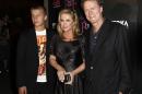 FILE - In this Sept. 30, 2008 file photo, Conrad Hilton, left, Kathy Hilton, center, and Rick Hilton arrive at the launch party of new MTV series "Paris Hilton's My New BFF" in Los Angeles. Conrad Hilton received 