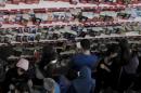 People look at books at the 20th International Book Fair (SILA) in Algiers