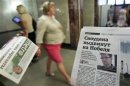 Photograph of former U.S. spy agency contractor Snowden is seen a page of a newspaper in Moscow