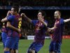 Barcelona's Busquets is congratulated by team mates Sanchez, Messi and Iniesta after scoring a goal agaisnt Chelsea during their Champions League soccer semi-final in Barcelona