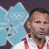 Giggs, who will captain the British soccer team at the Olympic Games, speaks during a Team Great Britain soccer news conference at the Main Press Centre in the Olympic Park in Stratford
