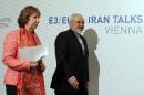 European foreign policy chief Catherine Ashton and Iranian Foreign Minister Mohamad Javad Zarif, from left, arrive to address the media after closed-door nuclear talks in Vienna, Austria, Wednesday, April 9, 2014. (AP Photo/Ronald Zak)