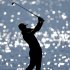Luke Donald, of England, hits off the fairway on the 17th hole during the final round of the Tour Championship golf tournament, Sunday, Sept. 23, 2012, in Atlanta. (AP Photo/David Goldman)