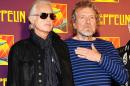 FILE - In this Oct. 9, 2012 file photo, members of Led Zeppelin, guitarist Jimmy Page, left, and singer Robert Plant appear at a press conference ahead of the worldwide theatrical release of "Celebration Day", a concert film of their 2007 London O2 arena reunion show, in New York. A federal judge in Los Angeles ruled Friday, April 8, 2016, that a copyright infringement lawsuit over the Led Zeppelin song "Stairway to Heaven" should be decided at trial. A trustee of late songwriter-guitarist Randy Wolfe sued the band claiming "Stairway to Heaven" copies the opening notes of a song created by Wolfe in the late 1960s. (Photo by Evan Agostini/Invision/AP, File)