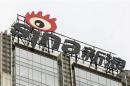 Company logo of Sina Corp is seen atop their headquarters in Beijing