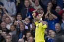 Chelsea's Diego Costa celebrates after scoring his second goal against Everton during their English Premier League soccer match at Goodison Park Stadium, Liverpool, England, Saturday Aug. 30, 2014. (AP Photo/Jon Super)