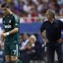 Real Madrid's Cristiano Ronaldo and coach Jose Mourinho look on during their Spanish First Division soccer match against Sevilla at Ramon Sanchez Pizjuan stadium in Seville