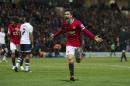 Manchester United's Abder Herrera celebrates after scoring during the English FA Cup Fifth Round soccer match between Preston and Manchester United at Deepdale Stadium in Preston, England, Monday Feb. 16, 2015. (AP Photo/Jon Super)