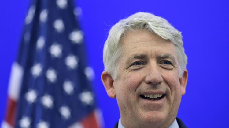 FILE - In this Dec. 18, 2013 file photo, Virginia Attorney General-elect Mark Herring smiles during a news conference at the Capitol in Richmond, Va. A federal judge ruled Thursday, Feb. 13, 2014 that Virginia's ban on same-sex marriage is unconstitutional, making it the first state in the South to have its voter-approved prohibition overturned. (AP Photo/Steve Helber, File)