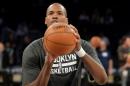 Jason Collins of the Brooklyn Nets warms up prior to the start of the game against the Los Angeles Lakers at Staples Center on February 23, 2014 in Los Angeles, California
