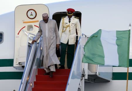Nigeria&#39;s President Buhari arrives on his official plane to attend the upcoming Nuclear Security Summit meetings in Washington on the tarmac at...