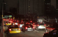Early morning commuters cross New York's Brooklyn Bridge, Wednesday, Oct. 31, 2012. Morning rush-hour traffic appeared heavier than on an ordinary day as people started to return to work in a New York without functioning subways. Cars were bumper-to-bumper on several major highways. (AP Photo/Richard Drew)