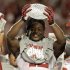 Alabama's Eddie Lacy holds up the championship trophy after the BCS National Championship college football game against Notre Dame Monday, Jan. 7, 2013, in Miami. Alabama won 42-14. (AP Photo/Chris O'Meara)