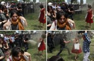 A combination photo of a Turkish riot policeman using tear gas against a woman as people protest against the destruction of trees in a park brought about by a pedestrian project, in Taksim Square in central Istanbul May 28, 2013.In her red cotton summer dress, necklace and white bag slung over her shoulder she might have been floating across the lawn at a garden party; but before her crouches a masked policeman firing teargas spray that sends her long hair billowing upwards. Endlessly shared on social media and replicated as a cartoon on posters and stickers, the image of the woman in red has become the leitmotif for female protesters during days of violent anti-government demonstrations in Istanbul.  Picture taken May 28.  REUTERS/Osman Orsal (TURKEY  - Tags: CIVIL UNREST)