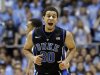 Duke's Seth Curry (30) reacts following a basket against North Carolina during the first half of an NCAA college basketball game in Chapel Hill, N.C., Saturday, March 9, 2013. (AP Photo/Gerry Broome)