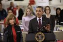 President Barack Obama, accompanied by American Red Cross President and CEO Gail J. McGovern, gestures while speaking during the his visit to the Disaster Operation Center of the Red Cross National Headquarter to discuss superstorm Sandy, Tuesday, Oct. 30, 2012, in Washington. (AP Photo/Pablo Martinez Monsivais)