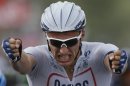 Marcel Kittel of Germany celebrates as he crosses the finish line to win the first stage of the Tour de France cycling race over 213 kilometers (133 miles) with start in Porto Vecchio and finish in Bastia, Corsica island, France, Saturday June 29, 2013. (AP Photo/Laurent Rebours)