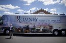 A Secret Service agent stands outside the bus of Republican presidential candidate, former Massachusetts Gov. Mitt Romney during a stop at Wawa gas station in in Quakertown, Pa. Saturday, June 16, 2012. (AP Photo/Evan Vucci)