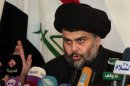 Shiite cleric Muqtada al-Sadr speaks during a press conference in the Shiite holy city of Najaf, 100 miles (160 kilometers) south of Baghdad, Iraq, Tuesday, Jan 1, 2013. The anti-American cleric Muqtada al-Sadr voiced support for Iraqi Sunni protesters who have been rallying against the country's Shiite-dominated central government and said the demonstrators have the right to demonstrate as long as they are peaceful. (AP Photo/ Alaa al-Marjani)