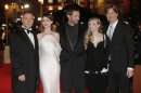 Actors Crowe, Hathaway, Jackman and Seyfried and director Hooper pose for photographers as they arrive for the world premiere of "Les Miserables" in London