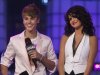 File-This June 19, 2011 file photo shows Justin Bieber and girlfriend Selena Gomez standing on stage during the 2011 MuchMusic Video Awards in Toronto. Bieber is no longer Gomez’s ‘Boyfriend,’ a source confirms to the AP. The split happened last week and distance and their busy schedules were a contributing factor. Eighteen-year-old Bieber is currently touring to promote his album, while 20-year-old Gomez is filming a “Wizards of Waverly Place” reunion for Disney Channel called “The Wizards Return: Alex versus Alex,” that will air next year. E! News was the first to report the split.  (AP Photo/The Canadian Press, Darren Calabrese,File)