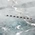 In this March 5, 2013 photo, a musher and dog team cross the ice between the Rohn and Nikolai checkpoints in Alaska during the Iditarod Trail Sled Dog Race.   (AP Photo/The Anchorage Daily News, Bill Roth)