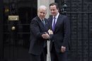 Britain's Prime Minister David Cameron bids farewell to U.S. Vice President Joe Biden at Number 10 Downing Street in London