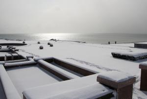 The snow-covered coast in the city of Rongcheng, in &hellip;