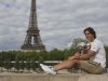 Rafael Nadal of Spain poses with the trophy after winning the men's final match against Novak Djokovic of Serbia at the French Open tennis tournament in Paris, Monday, June 11, 2012. Eiffel Tower seen in the background. (AP Photo/Michel Euler)