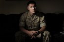 FILE - In this June 29, 2010, file photo, U.S. Marine Sgt. Lawrence Hutchins III poses for a portrait in Oceanside, Calif. The military's highest court has denied a government request to reconsider the overturned murder conviction of Hutchins, who has served more than half of his 11-year sentence in one of the biggest war crime cases to emerge from the Iraq war. Hutchins' military attorney said he was expected to be released Friday, July 19, 2013, and reassigned to Camp Pendleton north of San Diego. (AP Photo/Adam Lau, File)