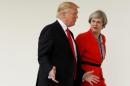 U.S. President Trump escorts British Prime Minister May after their meeting at the White House in Washington