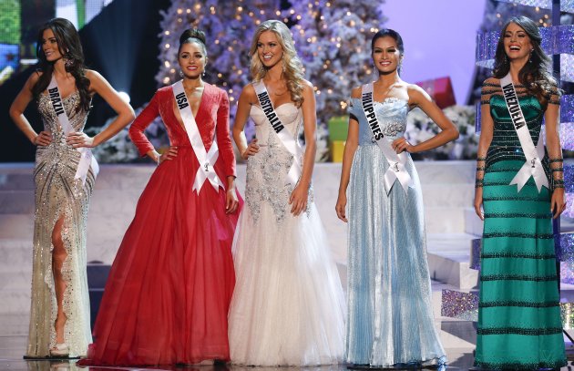 The remaining five contestants, from left, Miss Brazil, Gabriela Markus; Miss USA, Olivia Culpo; Miss Australia, Renae Ayris; Miss Philippines, Janine Tugonon; and Miss Venezuela, Irene Sofia Esser Quintero; stand together during the Miss Universe competition, Wednesday, Dec. 19, 2012, in Las Vegas. (AP Photo/Julie Jacobson)
