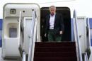 U.S. Defense Secretary Chuck Hagel walks off an aircraft upon his arrival at Yokota Air Force Base in Fussa