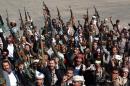 Yemeni armed members of the Shiite Huthi movement shout slogans as they take part in a demonstration in Sanaa on February 4, 2015 in support of the militia that overran the capital in September
