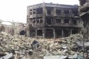 A view of rubble and damaged buildings after clashes between Free Syrian Army fighters and forces loyal to Syria's President Assad, in the old city of Aleppo