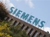 The logo of Siemens AG company is pictured atop factory in Berlin