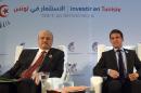 Algerian Prime Minister Abdelmalek Sellal (L) and French Prime Minister Manuel Valls attend the opening session of the "Invest in Tunisia, Start-up Democracy" international conference on September 8, 2014 in Tunis