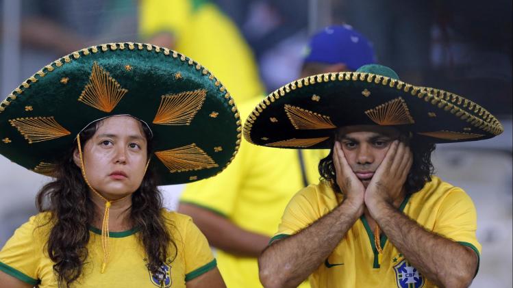 AP PHOTOS: Brazil fans in shock after 7-1 loss