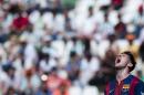 Barcelona's Lionel Messi gestures during a Spanish La Liga soccer match between Cordoba and FC Barcelona at El Arcangel stadium in Cordoba, Spain, Saturday May 2, 2015. (AP Photo/Daniel Tejedor)