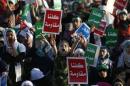 Supporters of the Jordanian Muslim Brotherhood take part in a rally in Amman