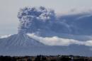 A thick plume pours from the Calbuco volcano, near Puerto Varas, Chile, Thursday, April 30, 2015. The olcano erupted again on Thursday, sending dark burst of ash and hot rock billowing into the air and prompting Chilean officials to order new evacuation of nearby residents. The eruptions at the Calbuco are the first in more than four decades. About 4,500 people have been evacuated since the Calbuco roared back to life on April 22, sending ash about 11 miles (18 kilometers) into the sky. (AP Photo/David Cortes Serey/ Agencia Uno) CHILE OUT - NO USAR EN CHILE